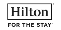 Logo Hilton, slogan 'For the Stay'.